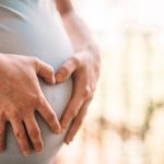 pregnant-woman-makes-heart-on-her-tummy-picjumbo-com